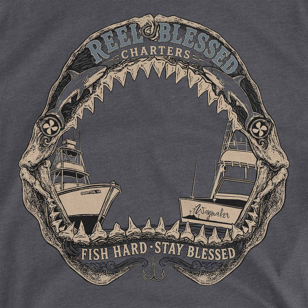 Heather Heavy Metal t-shirt with shark jaws framing two sportfishing boats: Reel Blessed Charters, Fish Hard, Stay Blessed