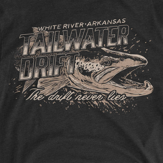 Heather Black t-shirt with a brown trout bursting through Tailwater Drift lettering: White River, Arkansas