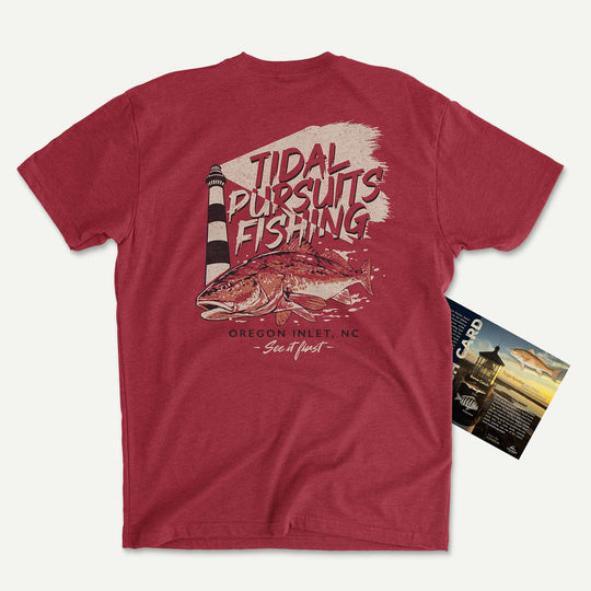 Cardinal t-shirt with a red drum below a striped lighthouse: Tidal Pursuits Fishing, Oregon Inlet, NC, See It First, with its Catch Card